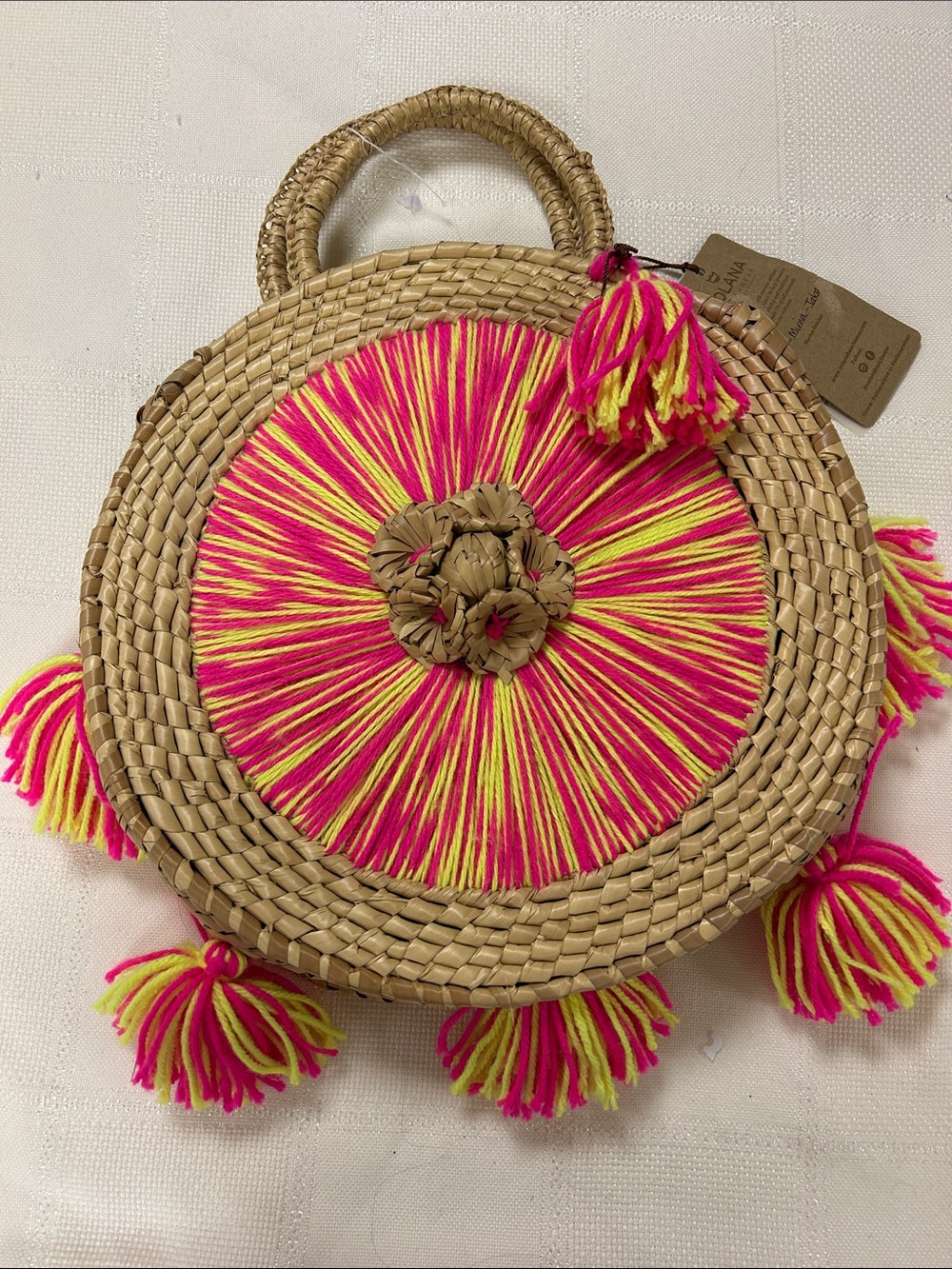 Solana Round woven Straw Tote with Hot Pink & Neon Yellow Tassel Detail
